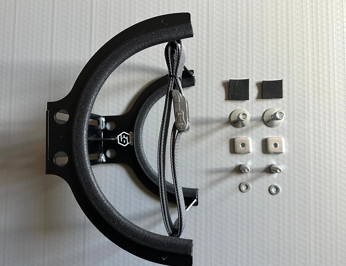 Propane tank bracket, cam strap and hardware.