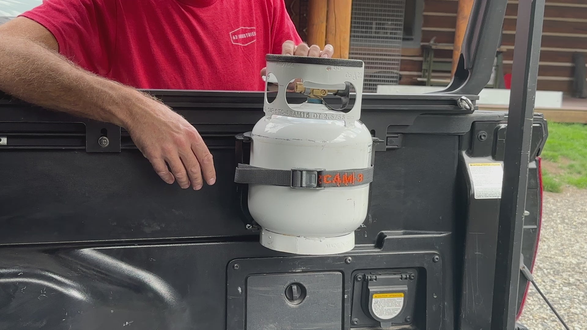 How to remove a propane tank from an installed propane bracket.